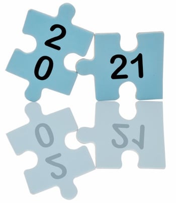 new-year-2021-on-blue-puzzle-with-reflection-on-white-background-picture-id1271645903